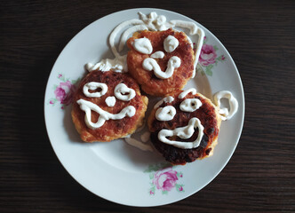 Obraz na płótnie Canvas Fun emoji baked goods on a plate for kids