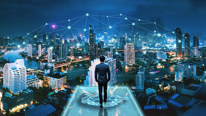 Business man on futuristic network city technology background