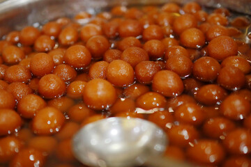Delicious Gulab jamun served indian wedding catering style .