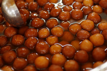 Delicious Gulab jamun served indian wedding catering style .