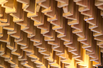 Graphic texture of wood planks with diagonal lighting.