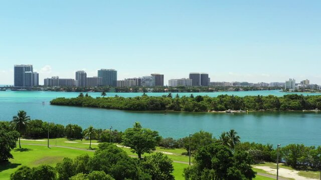 Aerial drone footage approaching Sandspur Island Miami Beach Biscayne Bay 4k