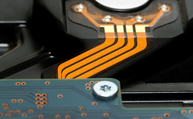 Back side of hard disk drive with orange tire