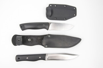 knife for camping and hunting in a plastic and leather case on a white background.  cutting tool.