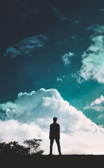 Fototapeta na wymiar silhouette of a man in the sky