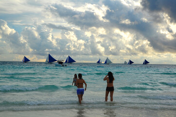 Beach shore and sail boats at Boracay Island in Aklan, Philippines