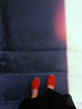 Foots in the shadow and light