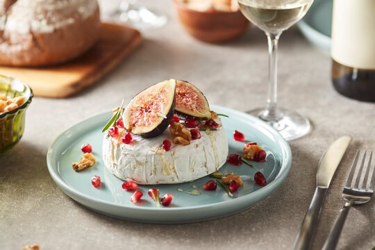 Mouthwatering cheese with figs and walnuts.