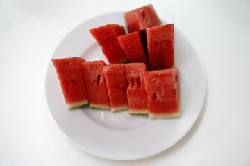 pieces of water melons on white dish
