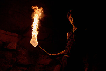 Mysterious Man Holding Torch