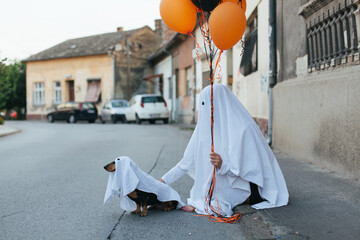 Ghost and his ghost dog on the street
