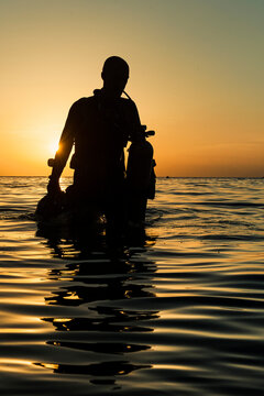Diver Wading in Water