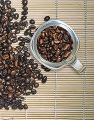 Coffee beans, roasted coffee beans, new roasted coffee beans Used to make illustrations And as a background in book publishing Or assembling billboards Sharp picture quality