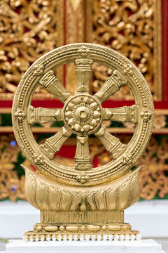 Golden statue of wheel