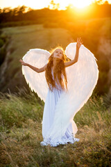 Fototapeta premium little girl with angel wings