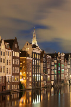 Row of Traditional old buildings in Amsterdam at night
