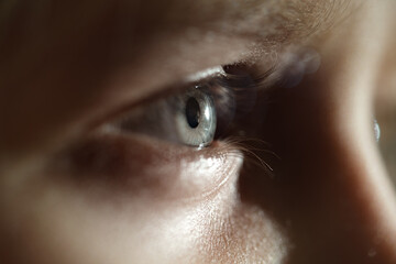 Macro close-up female/teenager eye. Iris, eyeball. Shallow depth of field