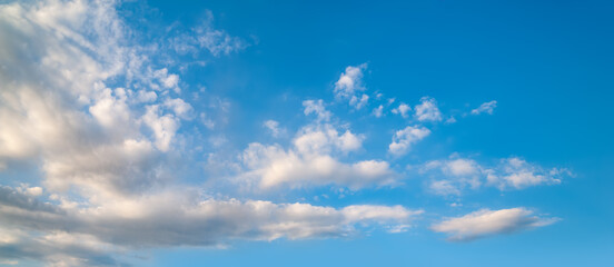 Cloudy sky. Panorama of blue sky with clouds. Natural landscape background.