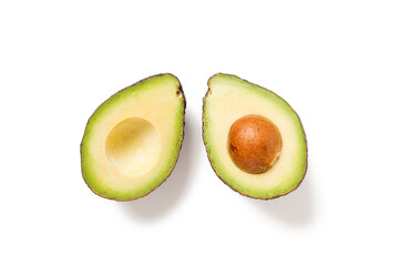 Two slices of avocado isolated on  white background. 