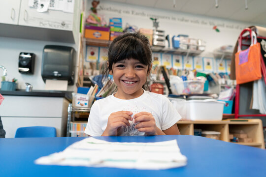 Student in classroom playing a game