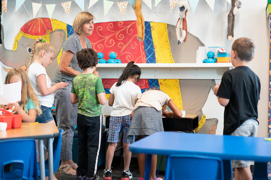 Students in classroom doing a crafts activity