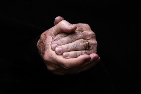 A pair of clasped old hands