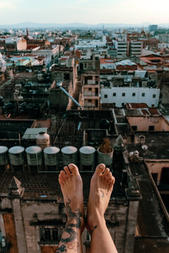 Feet to the air in a roof top