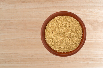 Top view of amaranth seeds in a small bowl