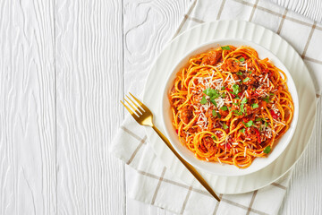 spaghetti with pork ragout, tomatoes, veggies, spices