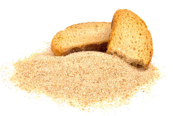 Pieces of dried bread and breadcrumbs isolated on white