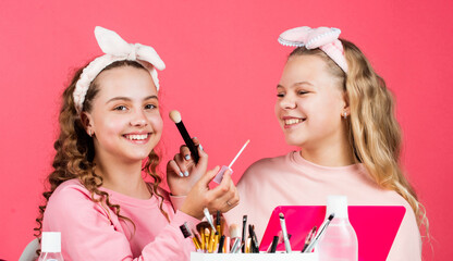 Young and free. beauty portrait of two children with natural make up and healthy skin. happy...
