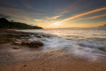 Stunning sunset at padang padang beach