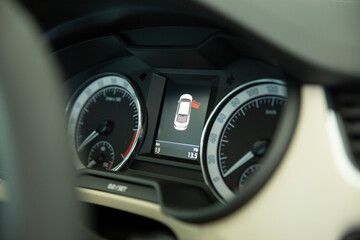 Close up shot with the digital dashboard of a car. display shows open door