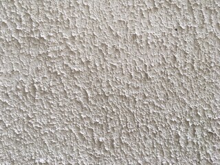 Gray concrete wall with rough finish