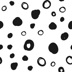 Doodle circles seamless pattern. Black dots texture background.