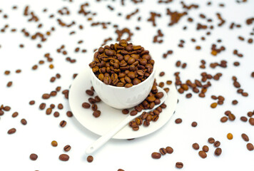 white coffee Cup and coffee beans on a white background, the concept of cheerfulness
