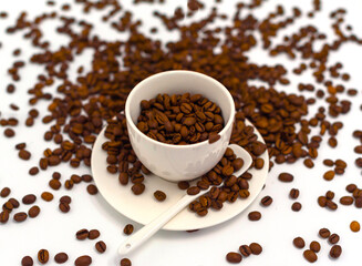 white coffee Cup and coffee beans on a white background, the concept of cheerfulness