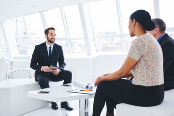 Marketing professional experts using services of experienced lawyer to solving important economic problems. Prosperous real estate agent telling benefits for buying headquarters for business meetings