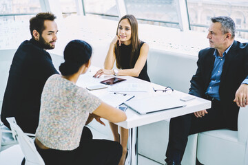 Diversity crew of creative marketing experts having brainstorming session with boos working on new...
