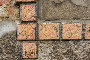 detail of the ruined facade of a Ceramics Factory in Vila Nova de Gaia in Portugal