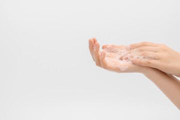 Soaping hands, process. Hands washing gesture, soapy female hand foam. Wash your hands concept.