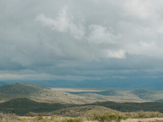 Naklejka premium clouds over the mountains