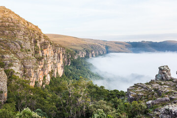 Dawn with fog at Guartela Canyon - sixth largest canyon in the world in length - Tibagi/ Parana -...