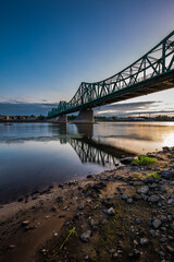 bridge over Vistula river in early misty morning. Wloclawek, Poland