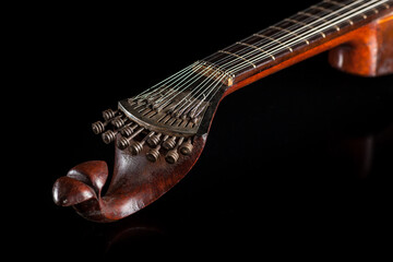 Portuguese guitar,  with tradicional fan (or peachow, watchkey) tuners - black background