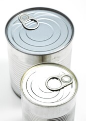 TIN OR CAN AGAINST WHITE BACKGROUND