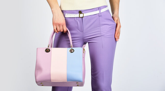 versatile handbag colors. sexy and confident blond carry shoulder bag. handbag fashion and beauty. tote or shopper bag for any occasion. woman use leather clutch. girl wear violet panties