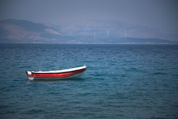 Red and White Boat on Sea