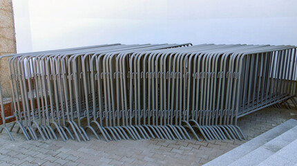 Many old movable metal fences