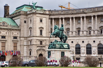 Fototapeta na wymiar statue of Prince Eugene and facade of Neue Burg in Hofburg Palace. Vienna Austria
